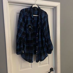 Torrid plaid shirt. Size 3 but fits like a 2. More fitted style